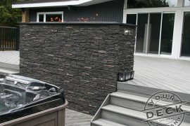 Deck builder in Milton. Custom fire feature on a Trex low maintenance deck