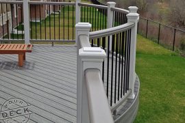 Deck builder in Stouffville. Trex Transcend curved railing.