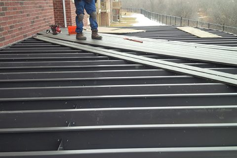 Image of Trex Island Mist decking installed on top of Trex Elevations steel deck framing