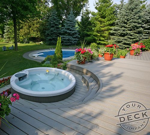 Curved Trex decking surrounding this hot tub