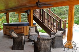 Waterproof deck with a cedar ceiling. Deck builder in Aurora