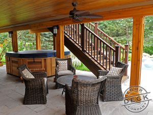 Waterproof deck with a cedar ceiling. Deck builder in Aurora