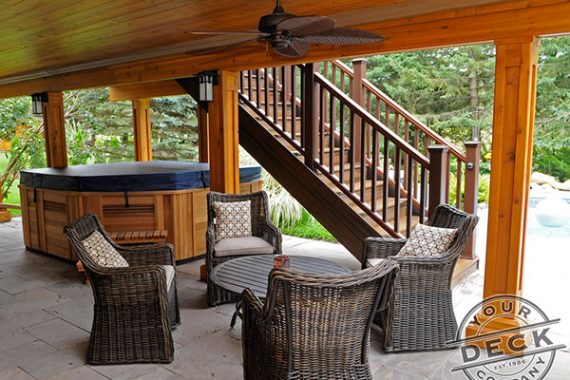 Waterproof deck with a cedar ceiling. Deck builder in Aurora